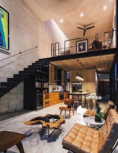Double-height loft with a mezzanine and open staircase